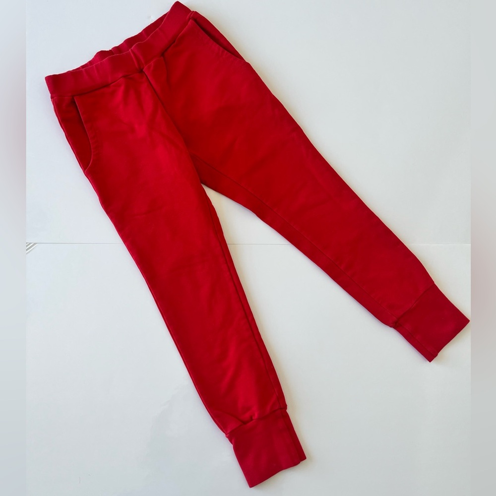 Ommillenen Finland brand. Vibrant Red Kids neutral gender organic Jogger Pants